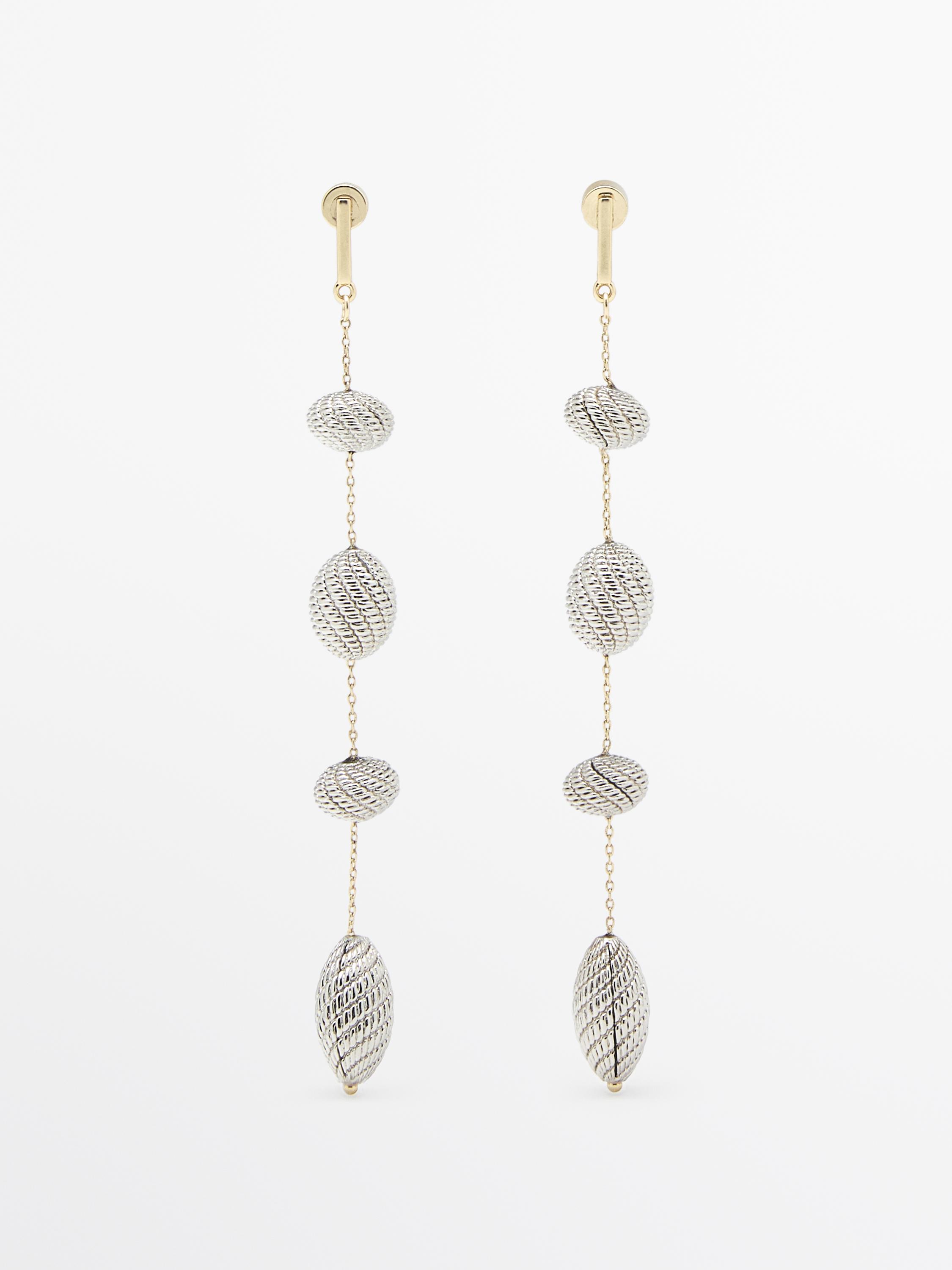 Boucles d’oreilles pendantes pièces texturées